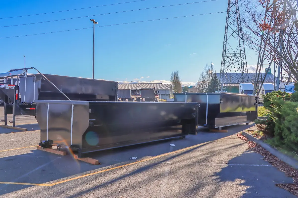 Roll-off dumpster ready for waste disposal at job site for 2 Yard Dumpster Rental in Louisville